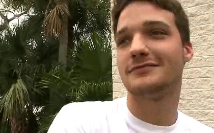 Cute guy stripping outdoors