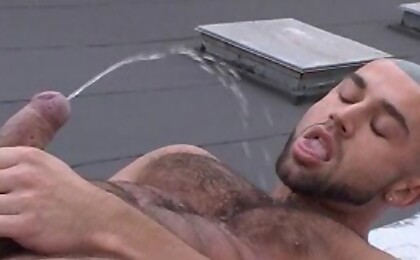 Francois Sagat jacking off his uncut dick and pissing