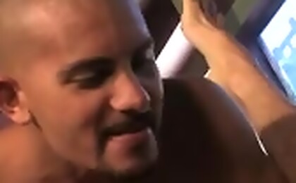 Standing behind the bar, Antonio stretches Tamas\' hole