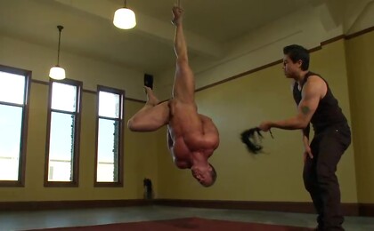 The amazing Derek Pain endures one leg suspension while being edged.