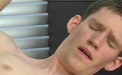 Brunette twink Kex Lyle plays with a dildo