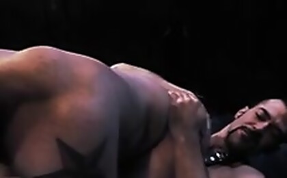 Stud in straitjacked give blowjob to a leather clad Soldier