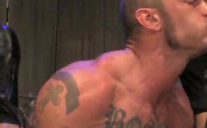 Muscled threesome. Tattooed guys fuck.