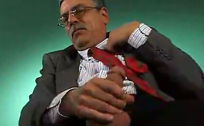 Silver daddy Ken Foster strokes dick