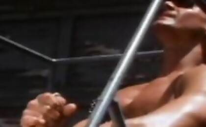 Bodybuilder wearing leather and wanking off his dick