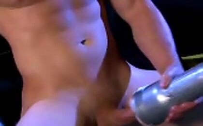 Masculed stud with his toy