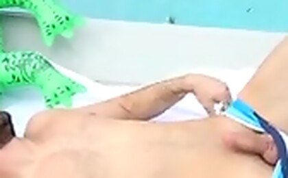 Stud jacking off on a crocodile