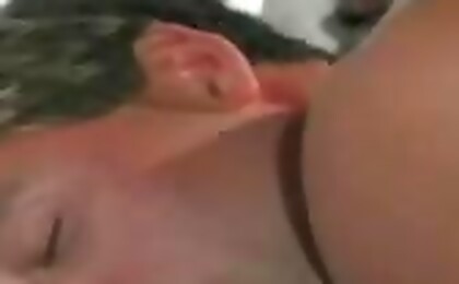 Stud plays with a big dildo