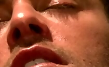 Tattooed stud plays with his cock