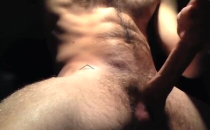Gay in black glasses wanking off his dick
