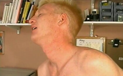 Two guys fucking in the office.