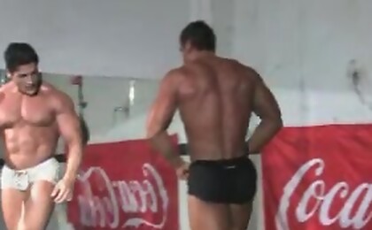 Bodybuilders wrestling