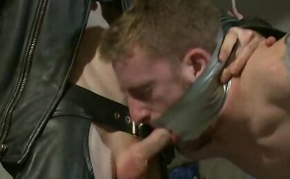 Dockworker gets taken down and fucked by a leather dom