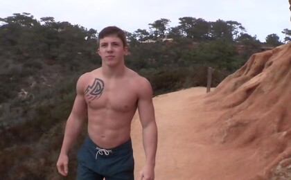 Musculed stud Burton wanking off his dick