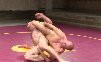 Hot muscled newbie Tatum "The Beast" takes on Eli "The Hammer" Hunter