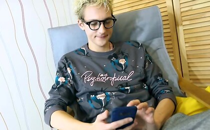 Slim uncut twink Andreas shoots a load