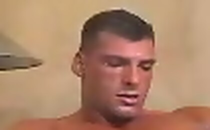 Oiled muscle man Tom jacking off dick