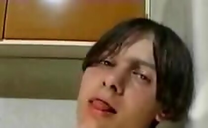 Seductive twink jerking his meat off in his own kitchen 
