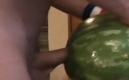 Hot guy fucking a watermelon in his kitchen in this video !