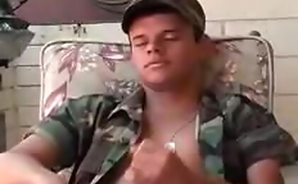 Cute army stud stroking his nice cock in this outdoor scene