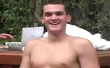 Cute army guy having fun playing with his cock outdoor