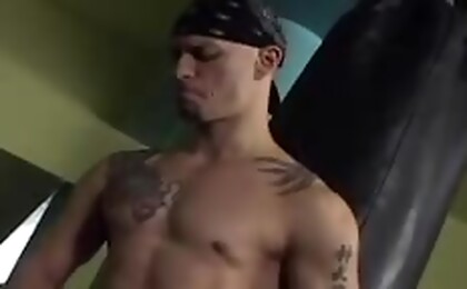 Cute dude hit the punching bag at the gym and then jerk off