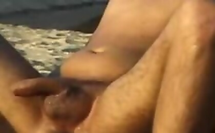 Two sexy and horny guys sucking and fucking on the beach. 