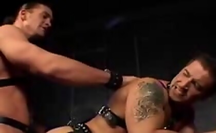 Two hot leather studs fucking and sucking in a dungeon 