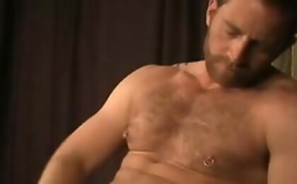 Tattoed stud having some hot solo masturbation fun here