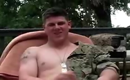 Soldier jerking off dick