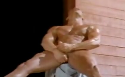 Big muscular man wacks off in the desert on a very hot day