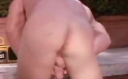 By himself in the jacuzzi, a sexy muscled man is jerking off