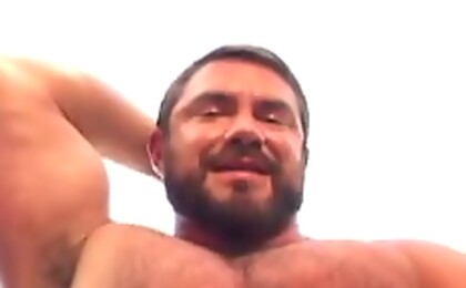 Muscular guy have an explosion of sperm while he masturbates