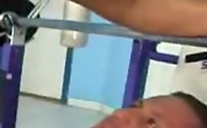 After a muscular training, two bodybuilders sodomize in gym.