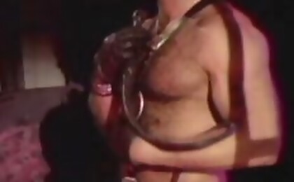 Lonely man puts some leather on his naked body & masturbates