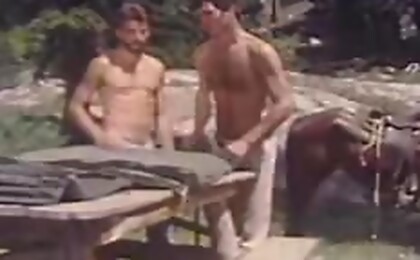 Country men enjoy a cock sucking session on a pic-nic table