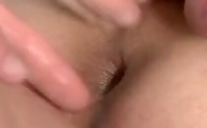 Shoving a dildo into ass; then a second dildo, then a hand !
