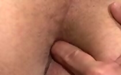 Brandon plays with his cock, squeezing it to a hardness !